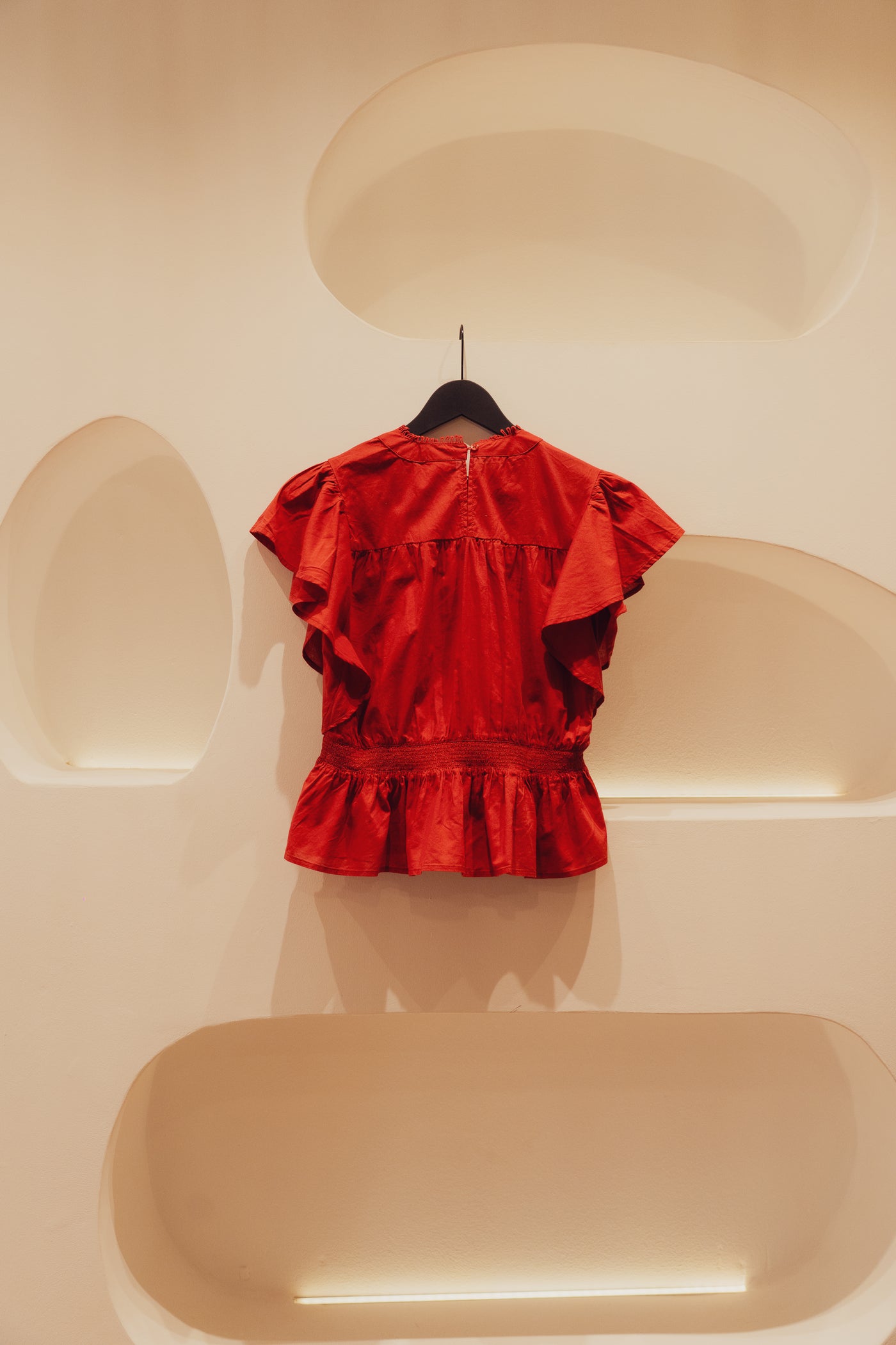 Summer blouse with embroidered details