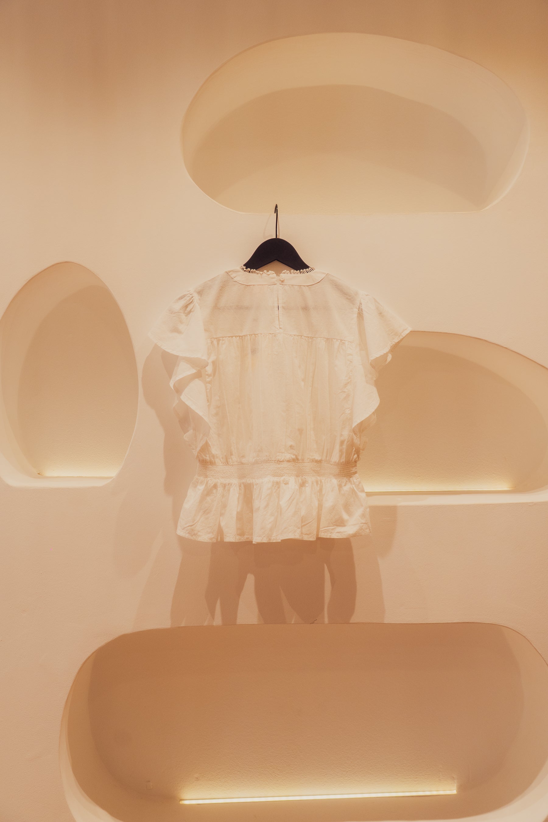 Summer blouse with embroidered details