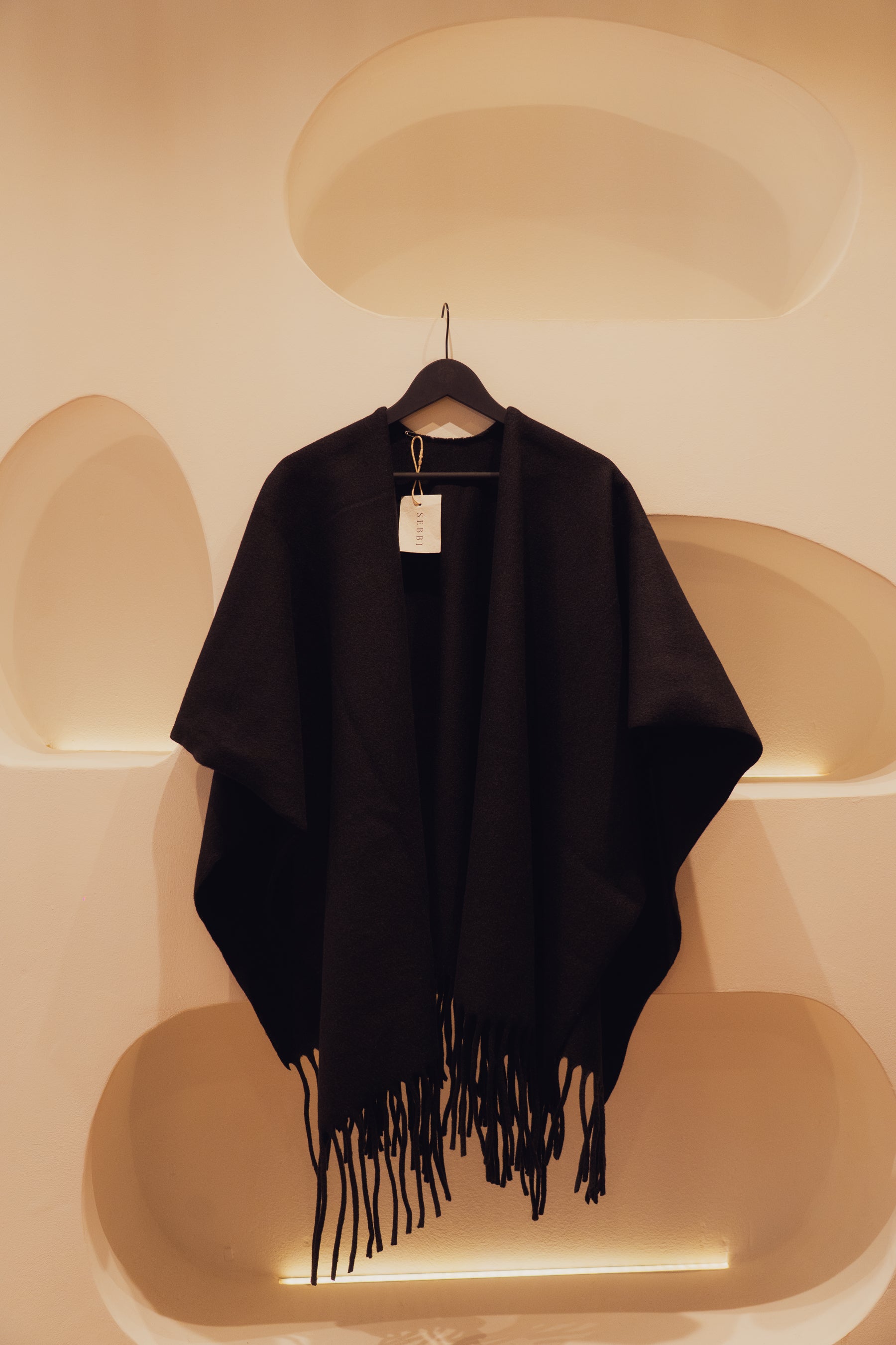 Black wool vest with fringes