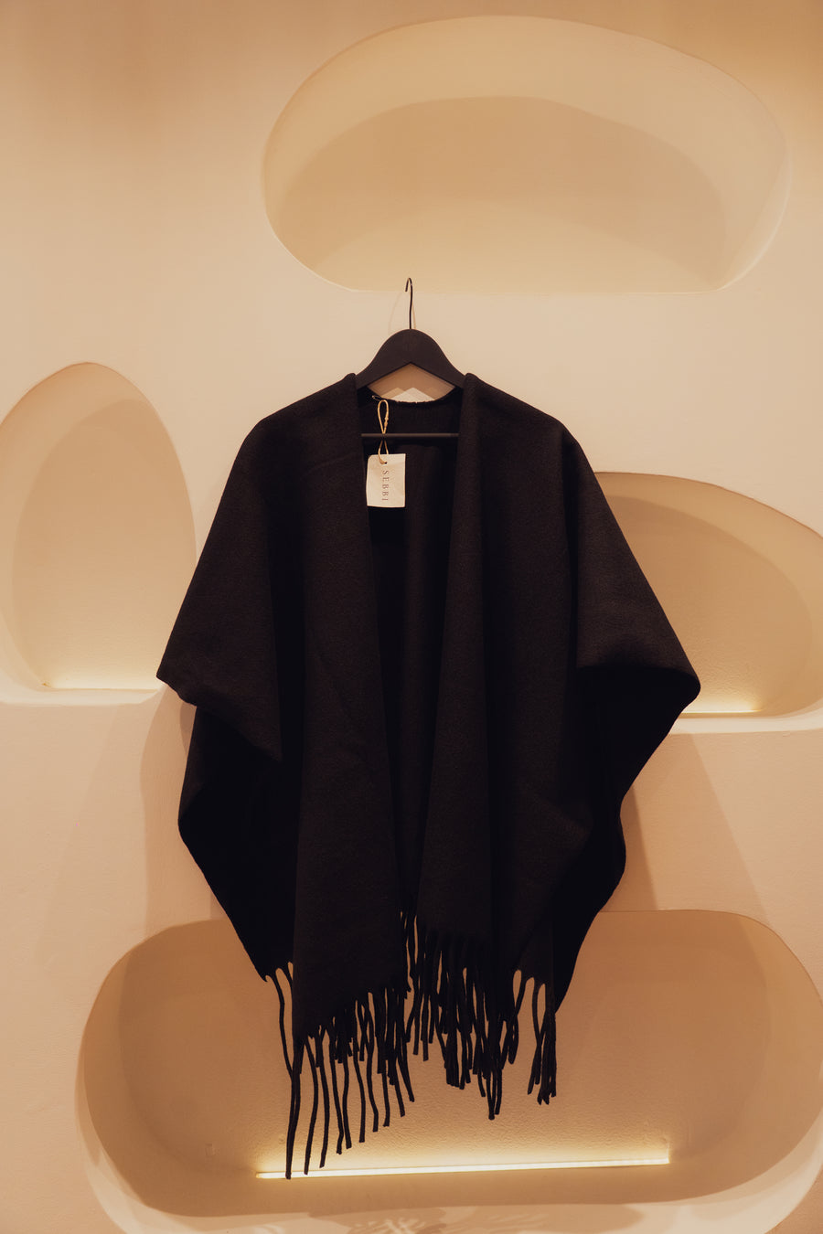 Black wool vest with fringes