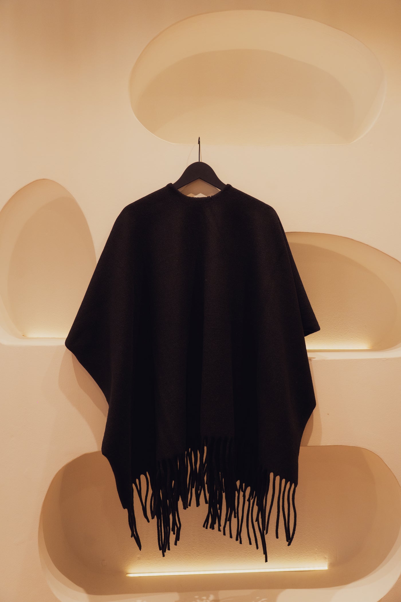 Black wool vest with fringes